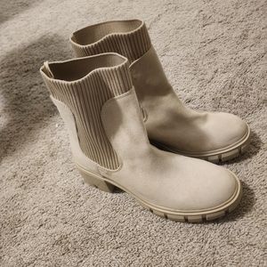 Beige womens any weather ankle boots.